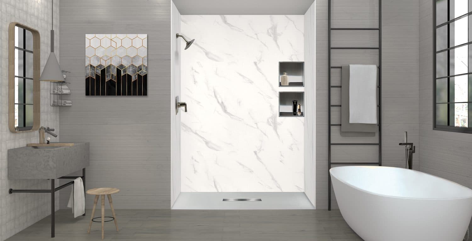 Low-profile shower base paired with marble-look wall panels